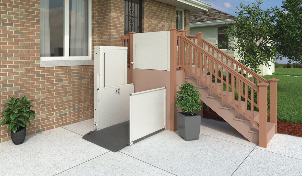 An outdoor wheelchair lift next to porch in front of home